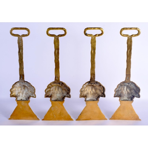 419 - FOUR GEORGE III STYLE BRONZE WHEATSHEAF DOOR STOPS. 40 cm x 12 cm. (4)