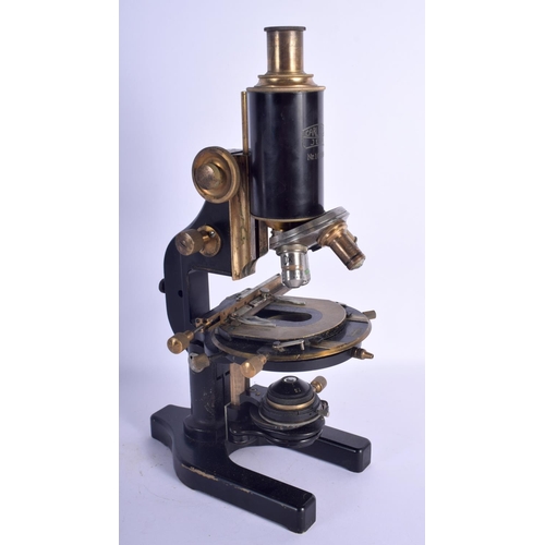 432 - A CARL ZEISS JENA NO 103304 MICROSCOPE. 36 cm high.