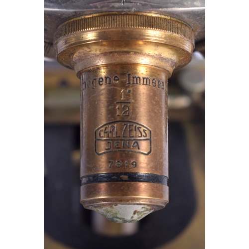 432 - A CARL ZEISS JENA NO 103304 MICROSCOPE. 36 cm high.