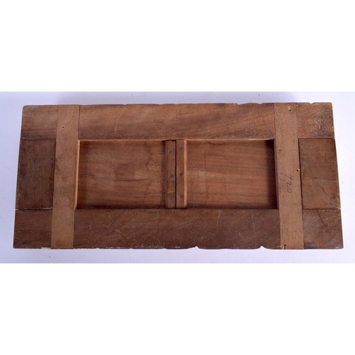 437 - A 19TH CENTURY BAVARIAN BLACK FOREST SLIDING WOOD BOOK RACK formed with foliage and gate posts. 46 c... 