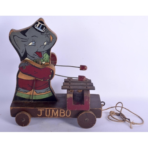 438 - A VINTAGE JUMBO THE ELEPHANT PAINTED WOOD CHILDS PULL ALONG TOY. 22 cm x 28 cm.
