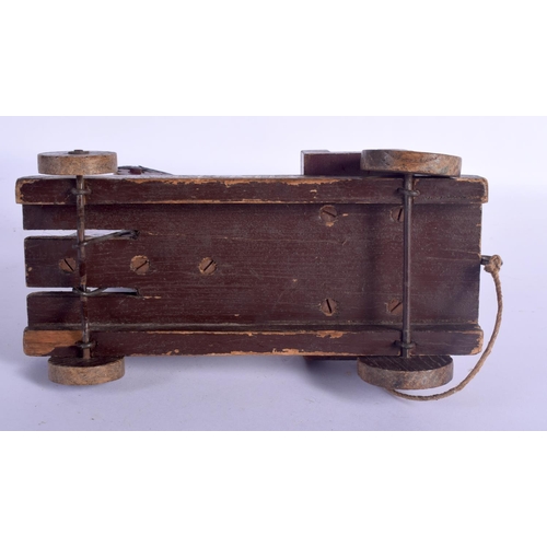 438 - A VINTAGE JUMBO THE ELEPHANT PAINTED WOOD CHILDS PULL ALONG TOY. 22 cm x 28 cm.