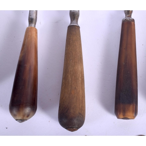 439 - ASSORTED 19TH CENTURY CONTINENTAL CARVED RHINOCEROS HORN CUTLERY in various forms and sizes. Largest... 