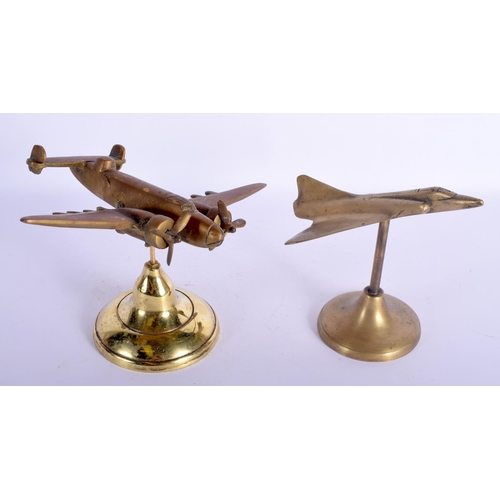440 - TWO EARLY 20TH CENTURY MILITARY GENTLEMANS POLISHED BRONZE DESK ORNAMENTS formed as planes. 16 cm x ... 