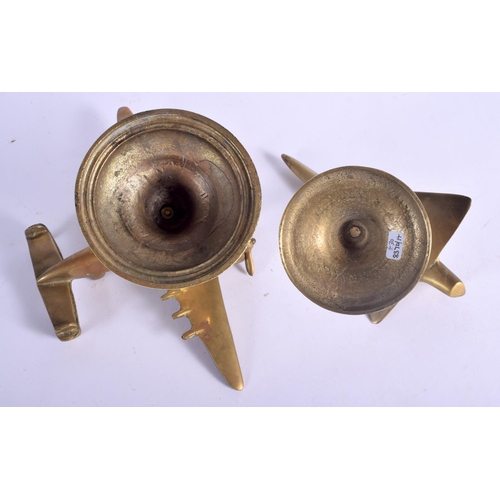 440 - TWO EARLY 20TH CENTURY MILITARY GENTLEMANS POLISHED BRONZE DESK ORNAMENTS formed as planes. 16 cm x ... 