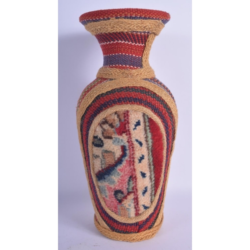 449 - AN EARLY 20TH CENTURY SOUTH AMERICAN OVERLAID POTTERY VASE decorated with motifs. 29 cm high.