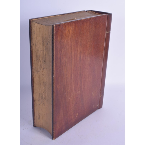 450 - AN EDWARDIAN NOVELTY CARVED WOOD BOOK MONEY BOX. 23 cm x 18 cm.