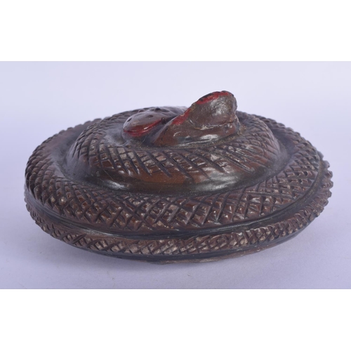 451 - A VERY RARE 19TH CENTURY SOUTH AMERICAN PAINTED STONE PAPERWEIGHT formed as a coiled snake. 9.25 cm ... 