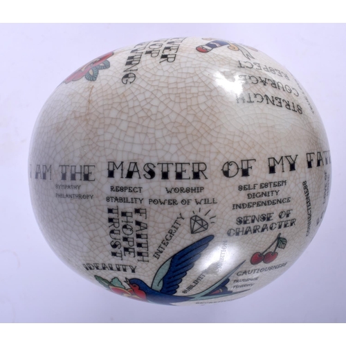 452 - A CONTEMPORARY POTTERY PHRENOLOGY HEAD together with a silvered bronze model of a skull. Largest 30 ... 