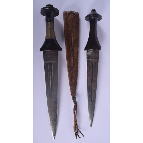 453 - TWO EARLY 20TH CENTURY CONTINENTAL KNIVES one with animal skin sheath. Longest 37 cm. (2)