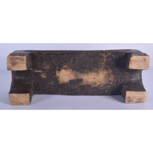 454 - AN UNUSUAL VINTAGE TRIBAL CARVED WOOD MANCALA GAMING BOARD with carved nut counters. Board 50 cm x 1... 