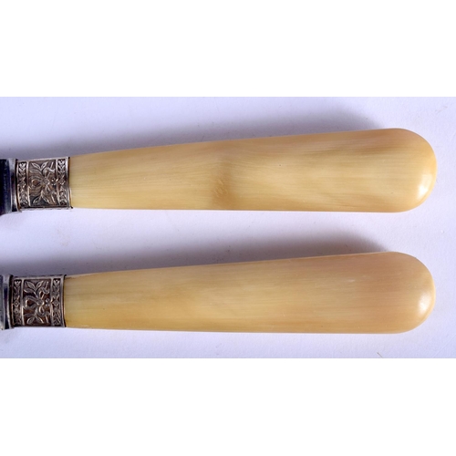 466 - A SET OF TWELVE 19TH CENTURY FRENCH BLONDE RHINOCEROS HORN KNIVES with embossed banding. 22 cm long.... 