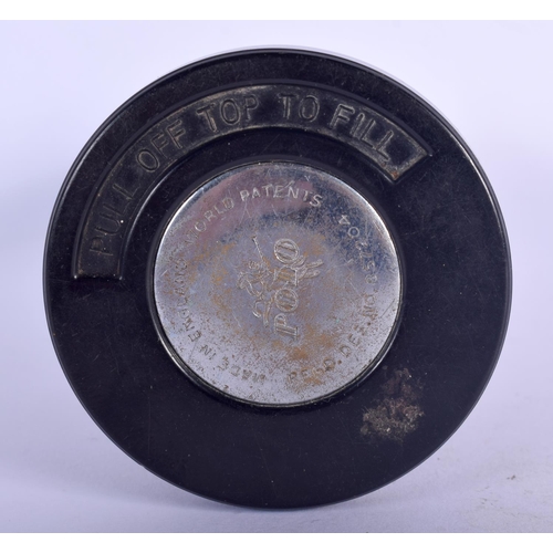 471 - A 1950S SILVER PLATED PATENT POLO GENTLEMANS CLUB LIGHTER with bakelite base. 14 cm high.