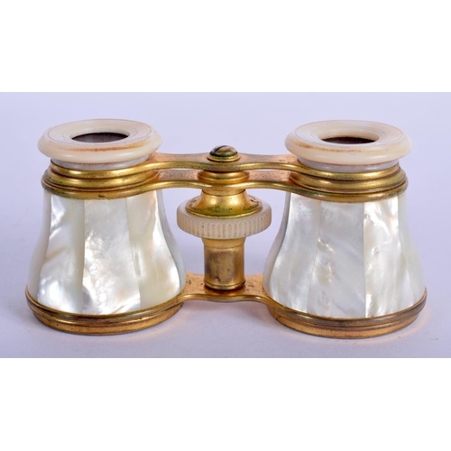 472 - A PAIR OF ANTIQUE MOTHER OF PEARL BINOCULARS with leather case. 9 cm x 6.5 cm extended.
