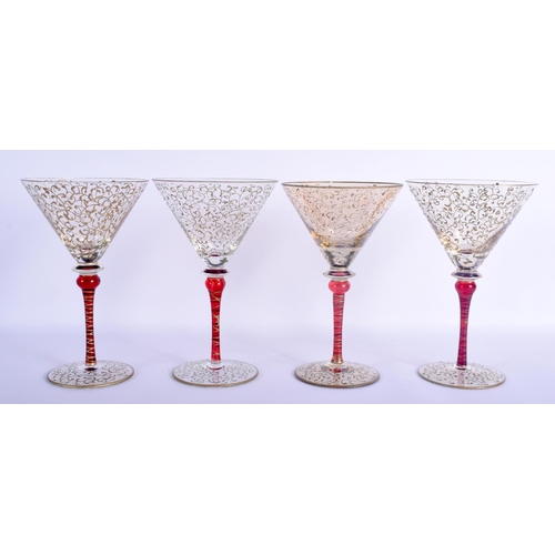 48 - A STYLISH SET OF FOUR VINTAGE MURANO VENETIAN GLASSES overlaid with trailing vines and foliage. 19 c... 