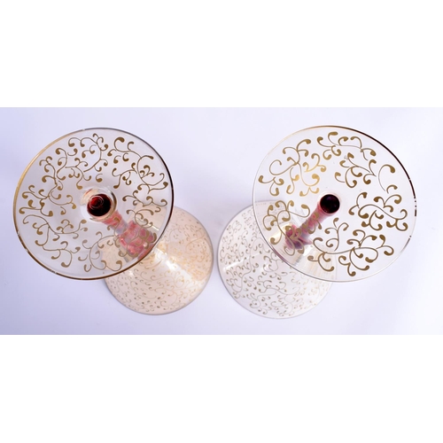 48 - A STYLISH SET OF FOUR VINTAGE MURANO VENETIAN GLASSES overlaid with trailing vines and foliage. 19 c... 