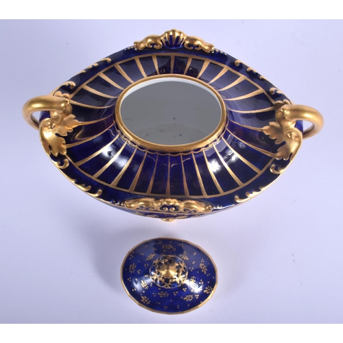 52 - A ROYAL CROWN DERBY TWIN HANDLED VASE AND COVER enamelled with gilded flowers. 13 cm x 12 cm.