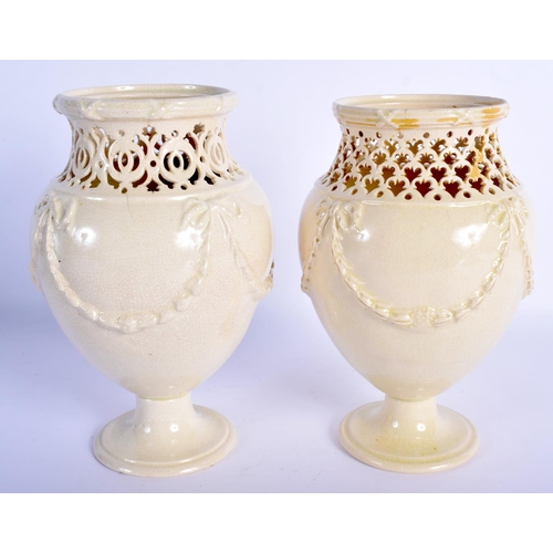 58 - A PAIR OF LATE 18TH CENTURY LEEDS CREAMWARE RETICULATED VASES with moulded overlaid swags and vines.... 