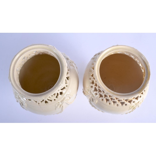 58 - A PAIR OF LATE 18TH CENTURY LEEDS CREAMWARE RETICULATED VASES with moulded overlaid swags and vines.... 