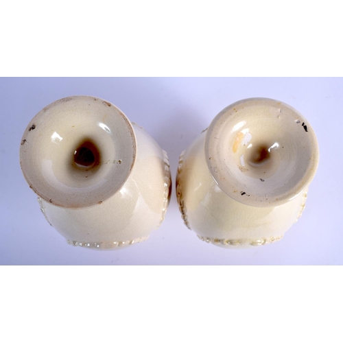 58 - A PAIR OF LATE 18TH CENTURY LEEDS CREAMWARE RETICULATED VASES with moulded overlaid swags and vines.... 