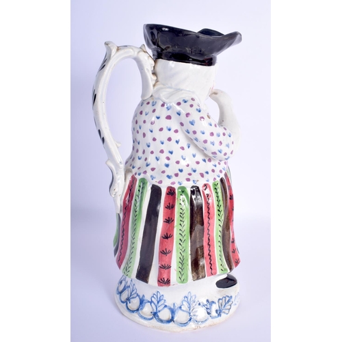 6 - A RARE 18TH/19TH CENTURY STAFFORDSHIRE PEARLWARE MARTHA GUNN CHARACTER JUG modelled taking snuff. 27... 