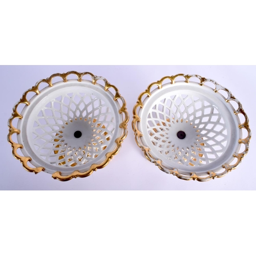 61 - A PAIR OF EARLY 19TH CENTURY FRENCH PARIS EMPIRE PORCELAIN PEDESTAL COMPORTS painted with flowers. 1... 