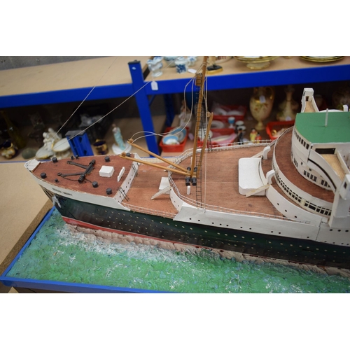 433 - A VERY LARGE MID 20TH CENTURY PAINTED SCRATCH BUILT MODEL BOAT OF THE QUEEN MARY modelled upon a pai... 