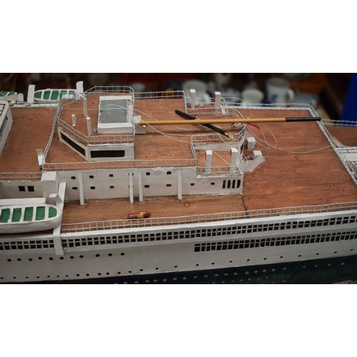 433 - A VERY LARGE MID 20TH CENTURY PAINTED SCRATCH BUILT MODEL BOAT OF THE QUEEN MARY modelled upon a pai... 