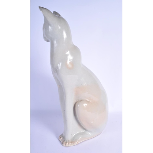 100 - A 1950S HEALS POTTERY FIGURE OF A SEATED CAT of elegant form. 54 cm x 20 cm.