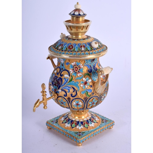 1021 - AN UNUSUAL CONTINENTAL SILVER GILT AND ENAMEL SAMOVAR decorated with foliage and vines. 158 grams. 1... 