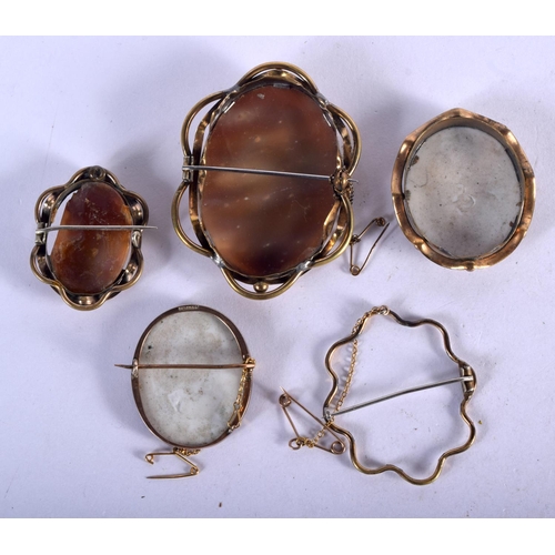 1047 - FOUR GOLD CAMEO BROOCHES AND ANOTHER FRAME (5)