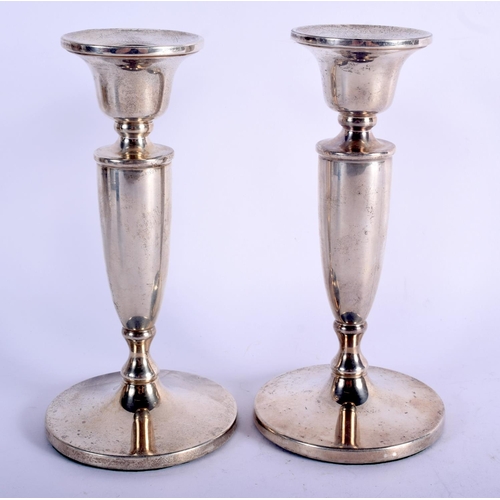 1051 - A PAIR OF 20TH CENTURY SILVER CANDLESTICKS.  Hallmarked Birmingham 1968, 17cm x 8.5cm, Total weight ... 