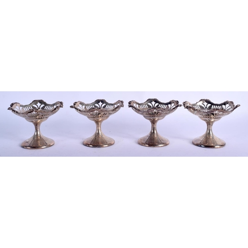 1085 - A CASED SET OF FOUR SILVER BON BON DISHES.  Hallmarked Birmingham 1936, 9.5cm wide x 7cm high, total... 