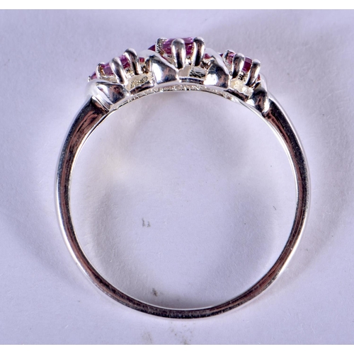 1092 - A SILVER AND GEM SET CLADDAGH RING.  Size P, weight 2g