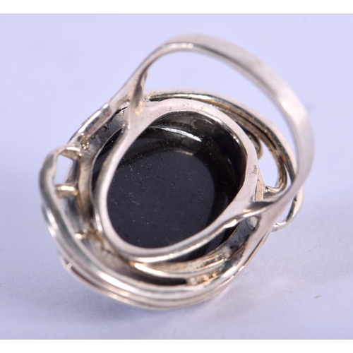 1093 - A SILVER RING INSET WITH A BLUE STONE.  Size P, weight 14g