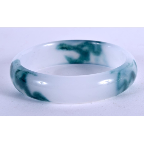 1094 - A TWO TONE JADE BANGLE.  Inner diameter 6cm, weight 48.5g