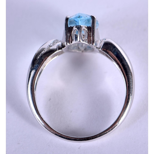 1097 - A SILVER RING INSET WITH A BLUE STONE.  Size P, weight 4.2g