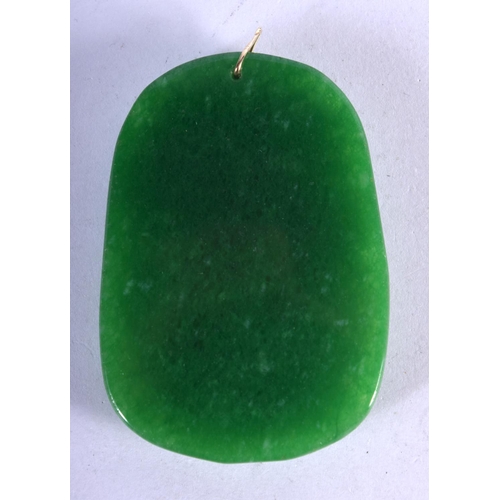 1108 - A GOLD TOPPED JADE PENDANT WITH A CARVED DRAGON.  6.4cm x 2cm. Weight 40.3g