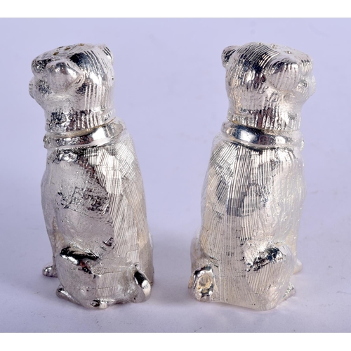 1113 - A PAIR OF SILVER PLATED CONDIMENTS IN THE SHAPE OF DOGS.  6.6cm x 2.5cm, weight 266g