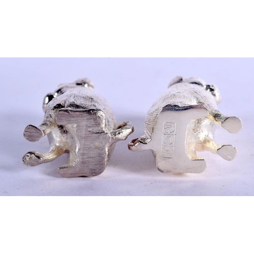 1113 - A PAIR OF SILVER PLATED CONDIMENTS IN THE SHAPE OF DOGS.  6.6cm x 2.5cm, weight 266g