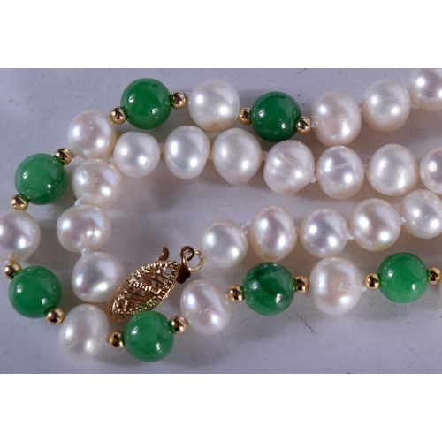 1135 - A JADE AND PEARL NECKLACE WITH 14CT GOLD CLASP.  Stamped 14K, length 44cm, weight 8.3g, beads 6.5mm