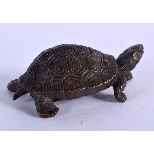 1137 - A BRONZE OKIMONO IN THE FORM OF A TORTOISE.  5.3cm x 3.3cm, weight 83.6g