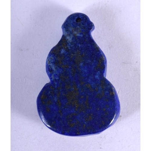 1144 - A LAPIS PENDANT WITH A CARVED WITH A BAT ON A GOURD.  4.5cm x 2.9cm. Weight 17.6g