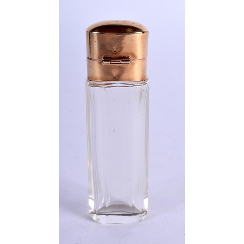 1145 - A GOLD TOPPED SCENT BOTTLE.  12.3cm x 4cm, weight 53.6g