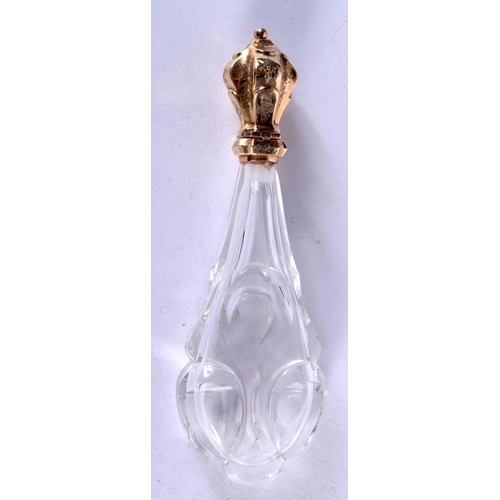 1146 - A GOLD TOPPED SCENT BOTTLE.  8.7cm x 2.5cm, weight 44.2g