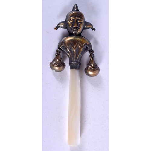 1245 - A BRASS BABIES RATTLE IN FOR FORM OF A JESTER.  9.6 x 2.6cm, weight 15.2g