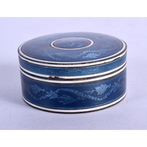 1251 - A CONTINENTAL BLUE ENAEL PILL BOX WITH ENGINE TURNED BASE.  4.4cm diameter, 2.2cm high, weight 48.5g