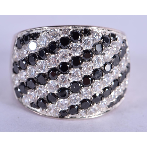 1329 - A SILVER GEM SET CLUSTER RING.  Size R, weight 7.8g