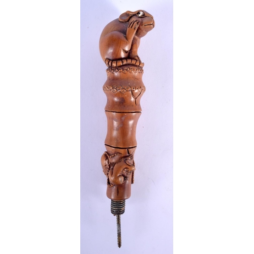 178 - A JAPANESE TAISHO PERIOD BOXWOOD CANE HANDLE formed with mice. 20 cm long.