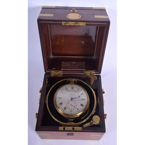 184 - A FINE 19TH CENTURY PARKINSON & FRODSHAM BRASS BOUND MARINE CHRONOMETER with twin brass handles. 15 ... 